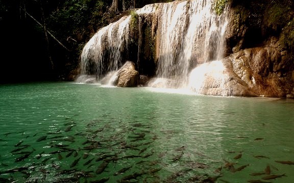 by reevery on Flickr.Erawan waterfalls in Erawan National Park located in western Thailand.