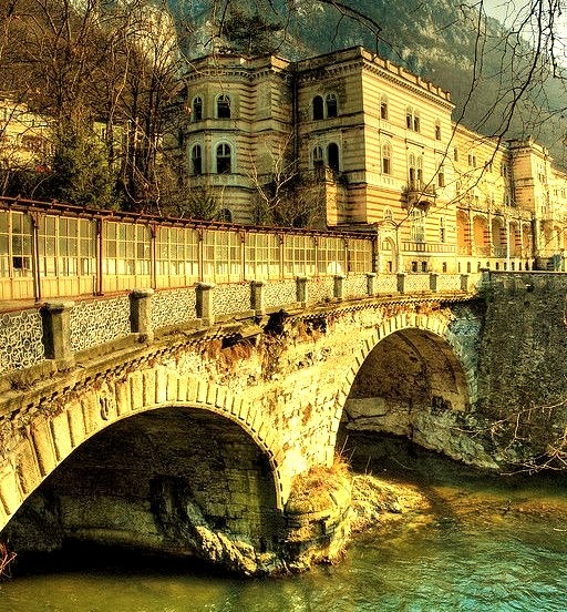 by cotropitor on Flickr.Bridge crossing Cerna river in Baile Herculane thermal spa resort, Romania.
