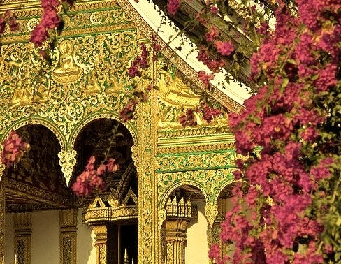 The golden facade of Wat Ho Pha Bang Temple, Luang Prabang, Laos